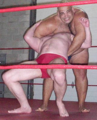 big wrestler dominating beating up smaller white dude.jpg