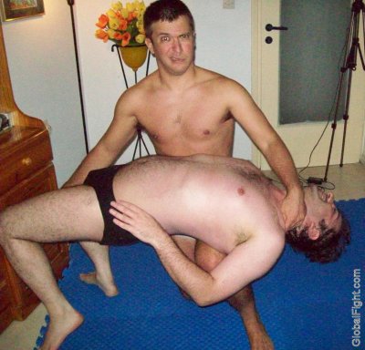 boy dominating friend home bedroom wrestling practice.jpg