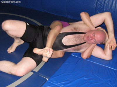 hot manly daddy wrestler caught in full nelson holds.jpg