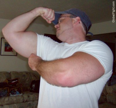big hairy arms flexing huge powerfull guns college jock pics.jpg