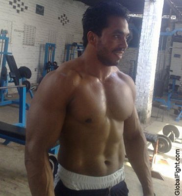 gay pakistan gym muscled bodybuilder man working out.jpg
