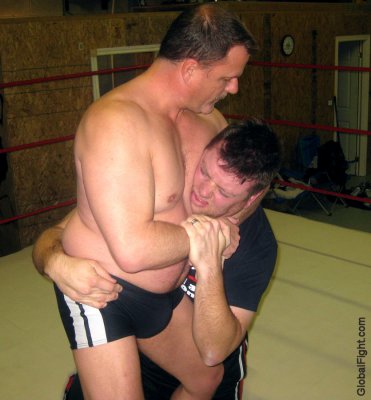 big heavyweight daddybear dominating man wrestling pics.jpg