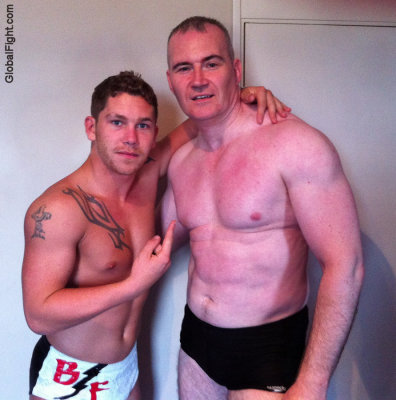 dad son wrestling tagteam wrestlers muscledudes.jpg