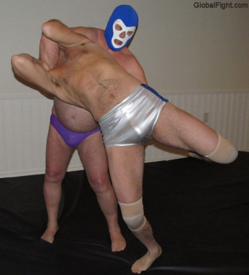big heavyweight wrestling men dominating smaller guys.jpg