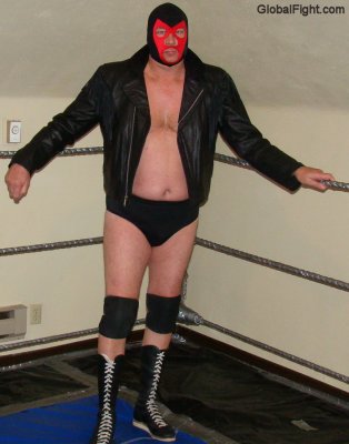 leather daddy pro wrestlers wearing vest boots heel wrestling styles.jpg