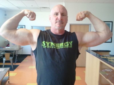 balding hot silverdaddie muscleman flexing huge thick bicep arms.jpg