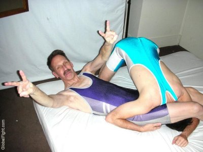 moustache daddy wrestling grappling his son bed pictures.jpg
