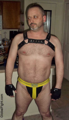gay daddybear leather pug wearing harness sppedos jockstrap.jpg