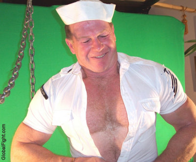navy dad ripping out of shirt pumping muscles.jpg