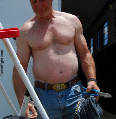 older maintenance man working shirtless.jpg