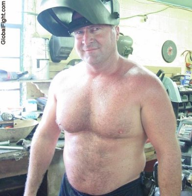 welder man working shirtless welding dad.jpg