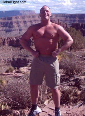 hiker flexing muscles grand canyon hiking shirtless.jpg
