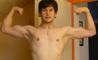 handsome college jock flexing smooth muscles cute guy.jpg