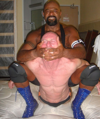 pro wrestling black musclebear manhandling beating white dad.jpg