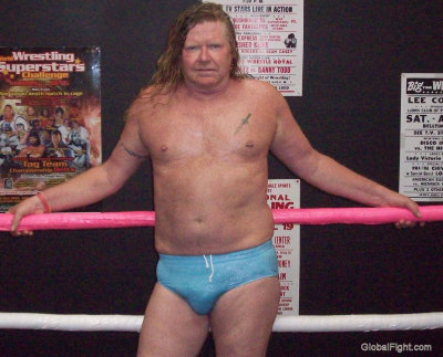 big blond pro wrestler posing ringside burly pictures.jpg