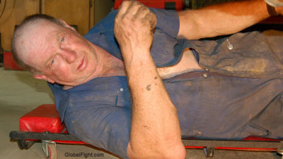 dirty on floor mechanic man working garage.jpg