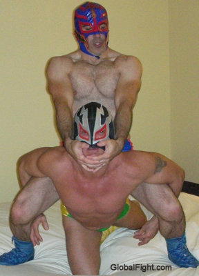 tuff masked pro wrestlers fighting.jpg