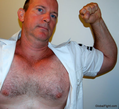 military men flexing arms hairy chests.JPG