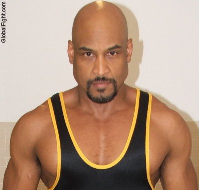 bald hot black dude wearing singlet.jpg