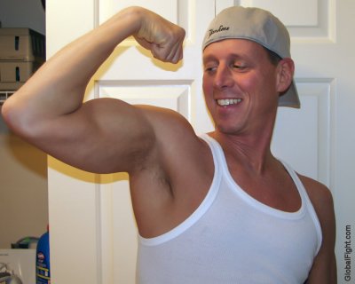 stud muffin wearing baseball cap tanktop.jpg