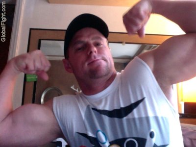 muscle hunk flexing muscles gay profile.jpg
