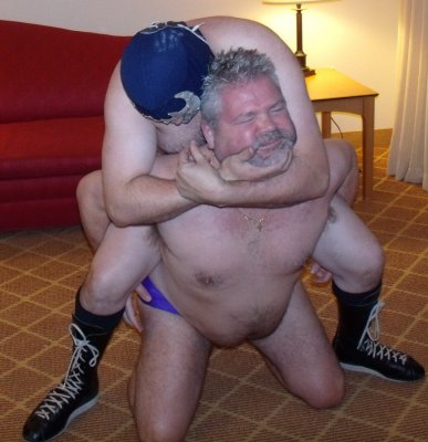 chubby dad getting beatup wrestling.JPG