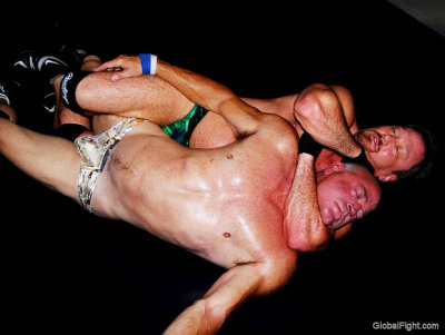 man beaten black and blue getting choked.jpg