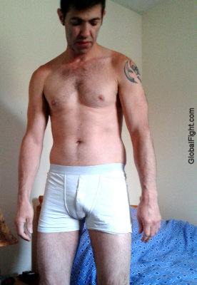 hot man wearing gym shorts bulges.jpg
