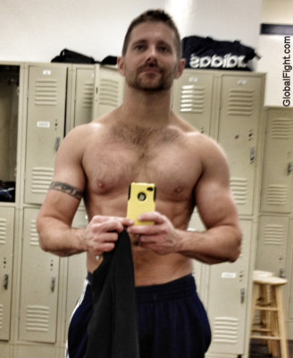 bearded jock boy showing off gym.jpg