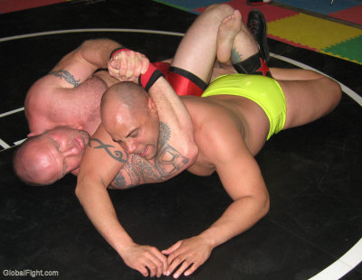 massively large muscles necklock hold.jpg