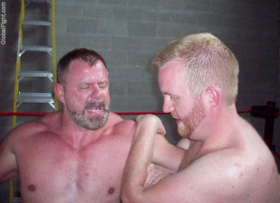 slender boy wrestling older muscleman.jpg