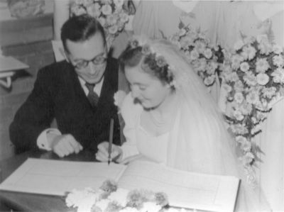 112 Eileen and Rons Wedding-Eileen and Ron signing register