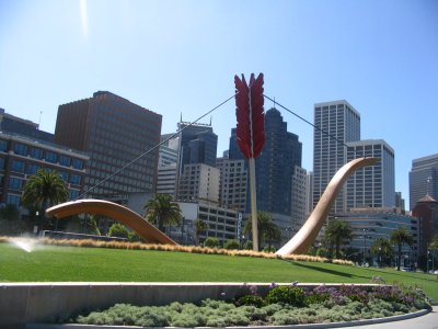 Cityscape and Cupid's (?) bow and arrow