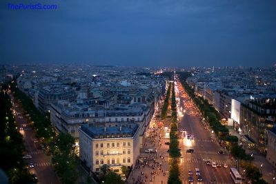 Twilight bustle on a grand Parisian boulevard