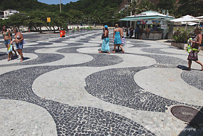Walkway at the beach depicting Rio's signature 'logo'.