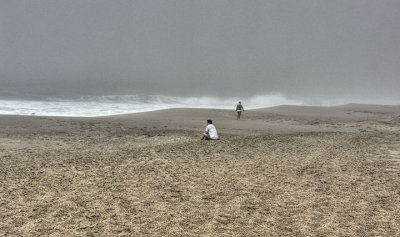 Meditation on a foggy beach
