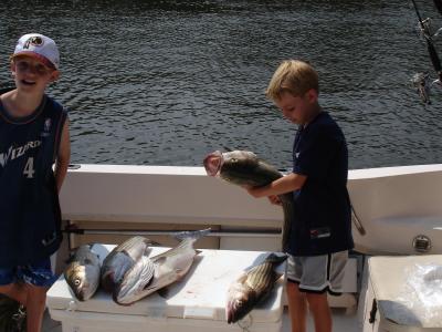 7/1/2006 Greer Family Charter - limited out with Stripers from 25 to 32 light tackle jigging