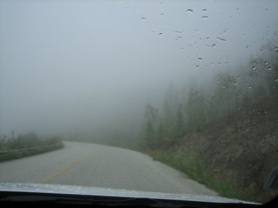 Clouds on top of the world road leaving Dawson City