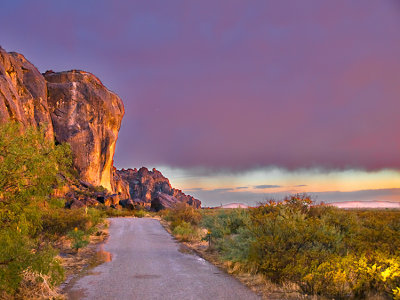 Rock and road at sunset