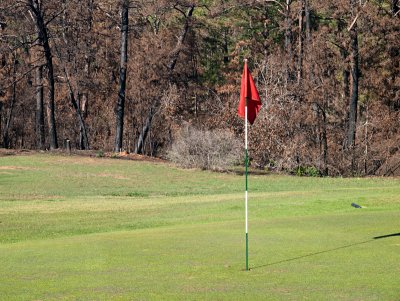 Fire threatens golf course