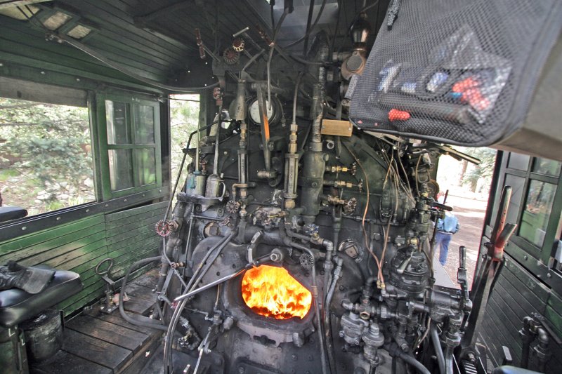 inside the engine, stoking the box.