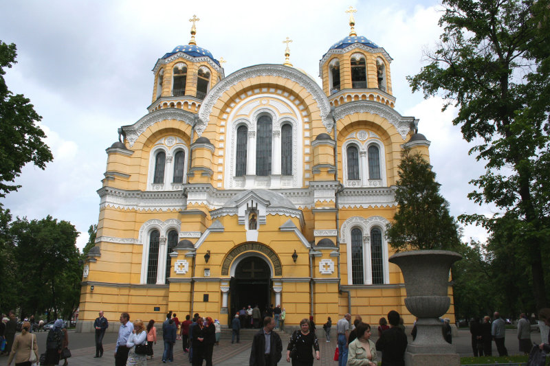 Saint Volodymyrs Cathedral is located across from the Kiev Botanical Gardens.