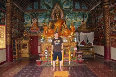 Me posing in front of the seated Buddha.