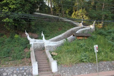 Stairs leading up the Phou Si Hill in Luang Prabang. The sides of the hill and top are studded with small temples and shrines.