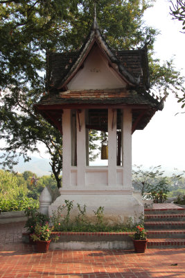 There is a bell inside this small structure.