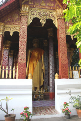This very tall standing Buddha is inside the temple.