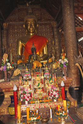Ornate interior with a large Buddha smiling benevolently down on all visitors.