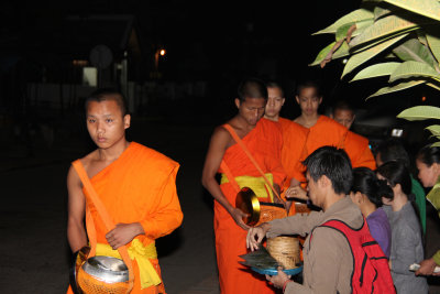 Every morning in Luang Prabang at about 6:00 am, the monks set out on a procession to collect alms.
