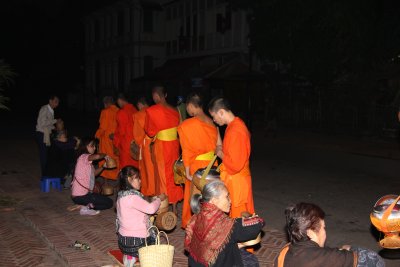 The procession down the main street of Luang Prabang is said to be the largest one in the world.