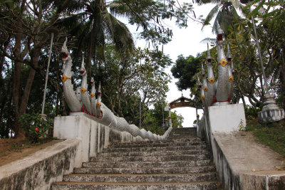 I walked down Th Chao Fa Ngum (street) and admired this stairway with a naga banister.